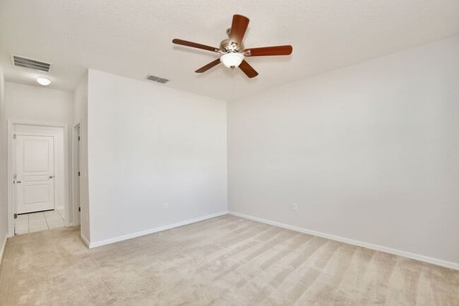 Building Photo - Stylish 4/3 Home with Covered Patio & Gara...