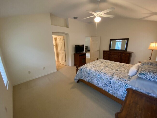 Building Photo - SEASONAL RENTAL. Large 4 Bed + 4 1/2 Baths Home, w/Views of the Jacaranda Golf Course and Lake in...