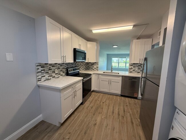 Building Photo - 7355 Woodmont Terrace