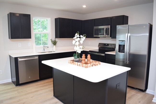 Building Photo - Modern 3-Bedroom Townhouse with Garage & Private Patio