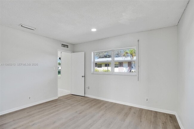 Building Photo - 2621 SW Natura Ave