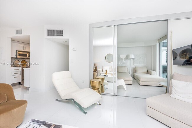 Building Photo - 10275 Collins Ave
