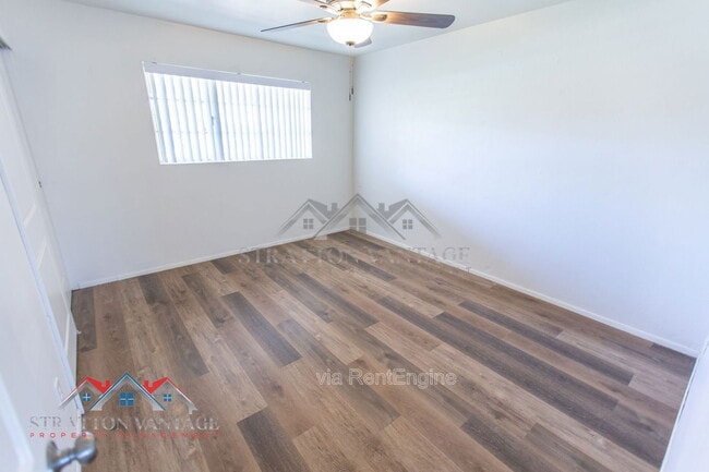 Building Photo - 8119 E Amelia Ave