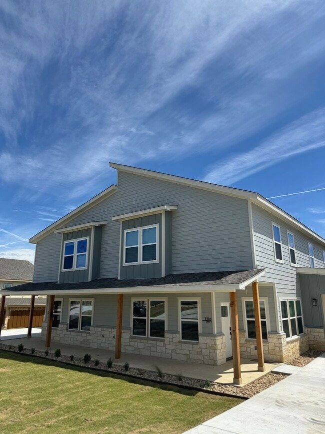 Building Photo - Beautiful modern Townhome in Peaster ISD NO Water Bill -  Fenced Yard - GATED: Spring Move in Spe...