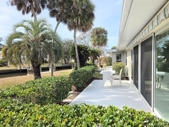 Building Photo - Beautiful 2-bedroom, 2-bath waterfront villa