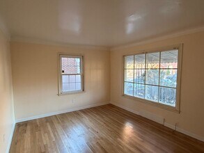 Building Photo - Section 8 welcomed at this modern rehabbed...