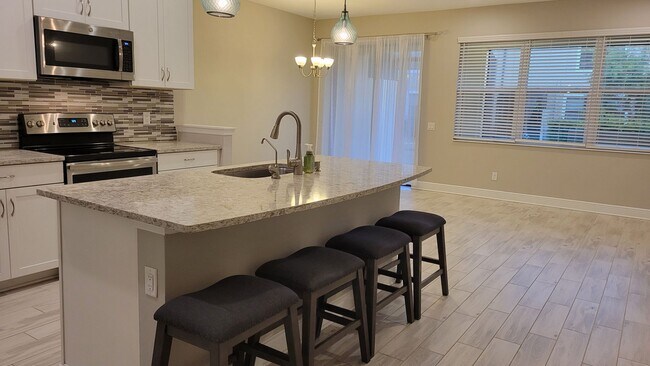 Building Photo - Annual UNfurnished newer 3/ 2 /12 townhome off SR-70 in gated community