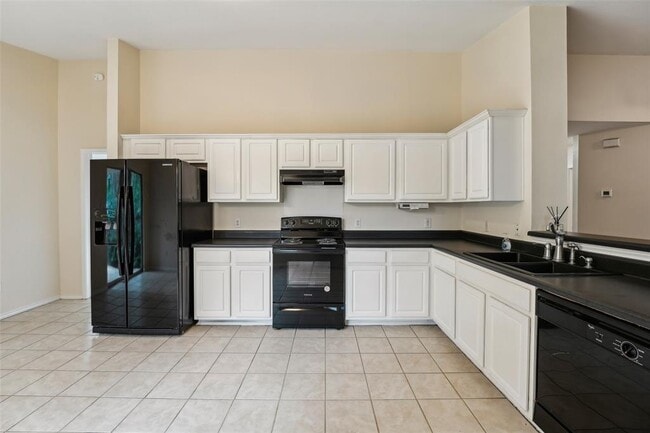 Building Photo - 11201 Canterbury Tales Ln