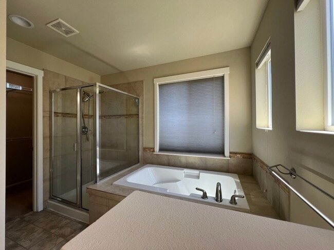 Building Photo - Spacious 4 Bedroom Home with Zen Backyard and 3-Car Garage