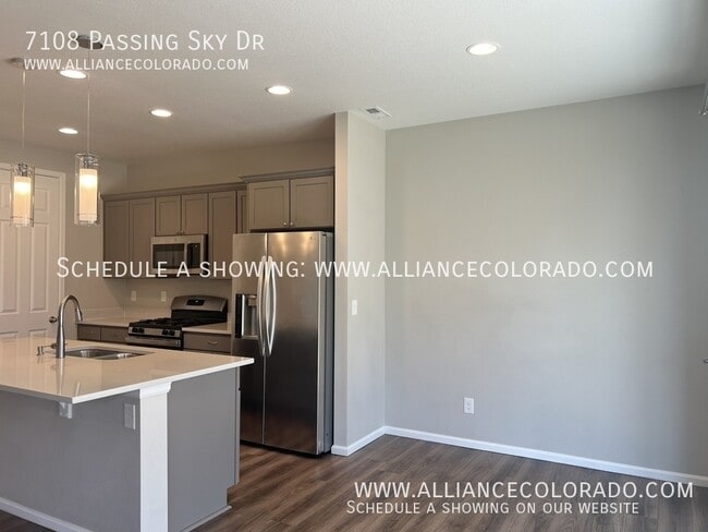 Building Photo - 7108 Passing Sky Dr