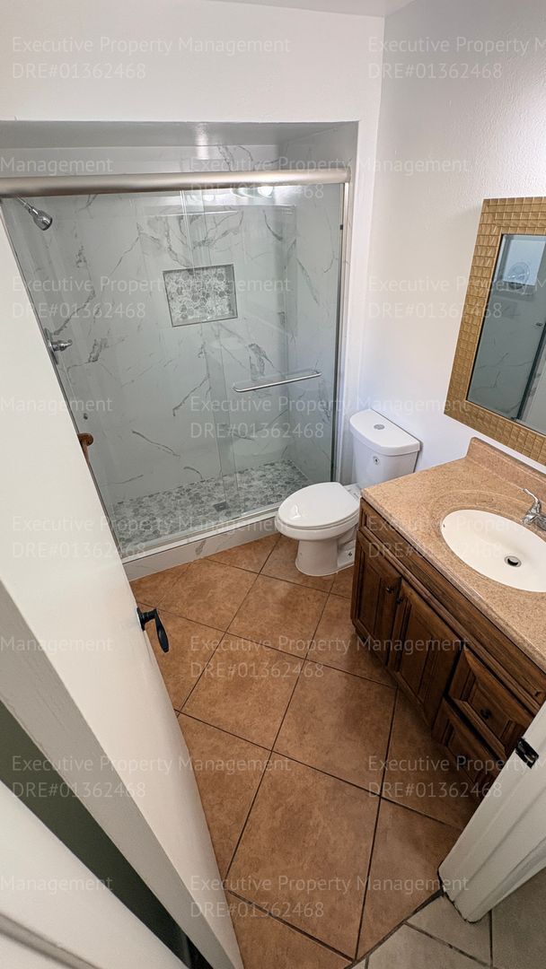 Building Photo - 3 bedroom 2 bathroom home on a corner lot with extra fenced parking.