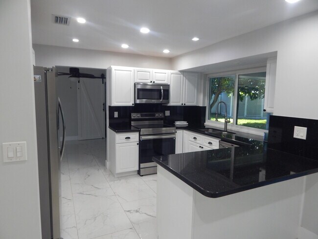 Building Photo - 8301 Wilton Dr