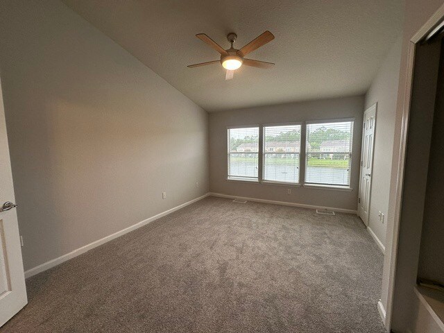 Building Photo - Stunning Townhome With Pond View In Gated Community