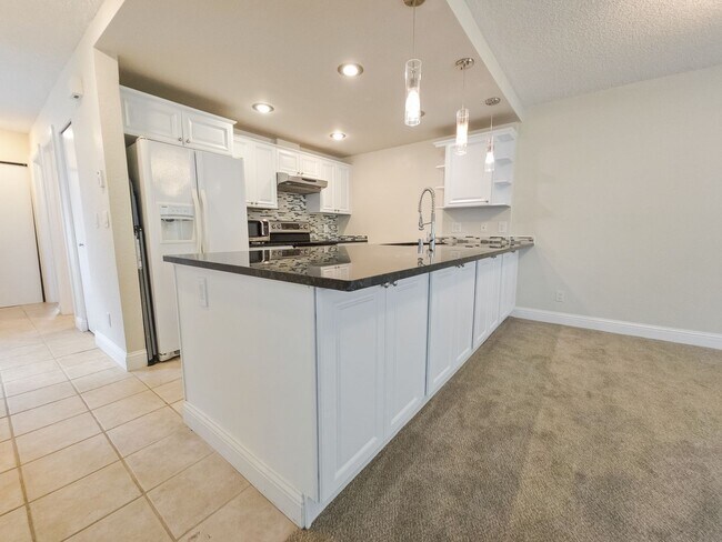 Building Photo - On-the-Water Living Experience: 2BR/2BA Co...