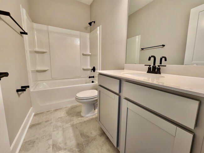 Building Photo - LIKE NEW Executive Home In Coveted Midtown...