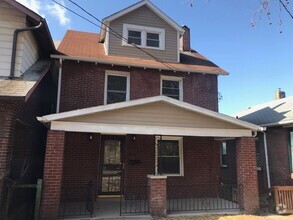 Building Photo - Super Cute 2 Bedroom, 1 Bath Brick Home - ...