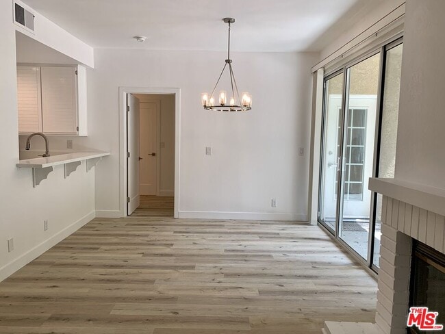 Building Photo - 8505 Gulana Ave