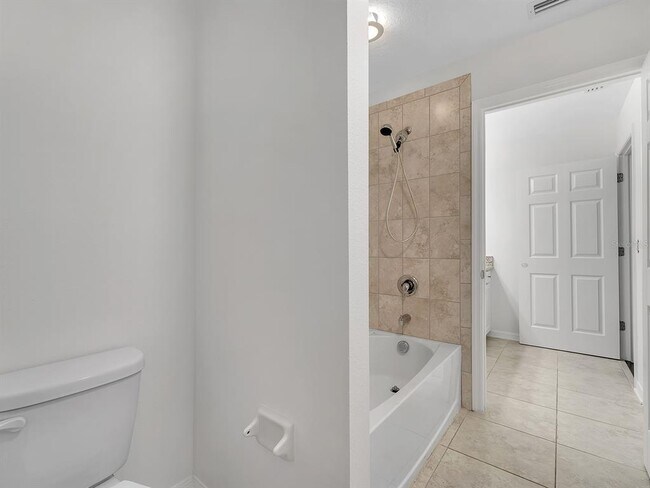 Building Photo - 7323 Pool Compass Loop