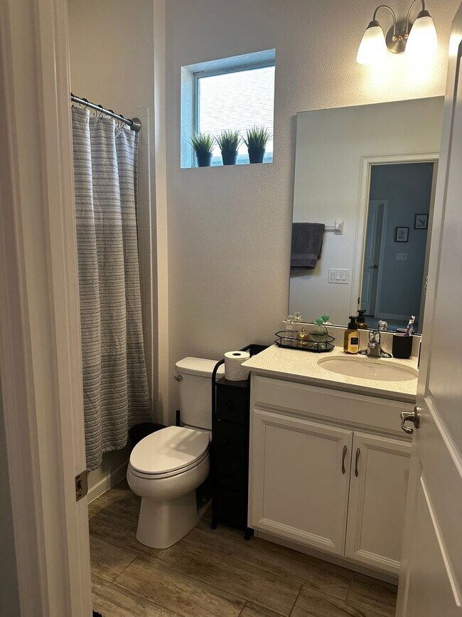 Building Photo - Welcome to this inviting 3/2 single family home located in Compass Landing