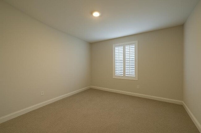 Building Photo - Get ready to fall in love—this sleek, modern beauty in West Creek Farms is bringing the wow facto...