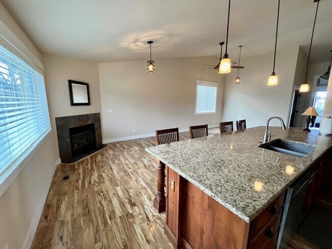 Building Photo - THREE-CAR GARAGE! This charming home offers 3 bedrooms, plus an office/rec room, and 2 bathrooms.