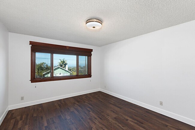 Building Photo - Timeless 4BR/2BA Corner-Lot Home, Perched on the Hills of Ocean Beach. Sweeping Ocean Views