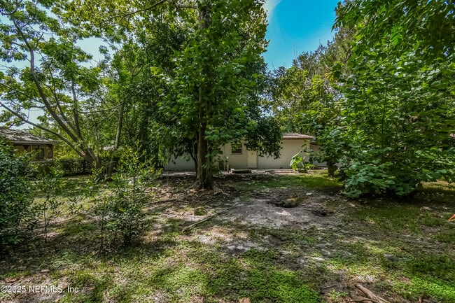 Building Photo - 6965 Miss Muffet Ln N