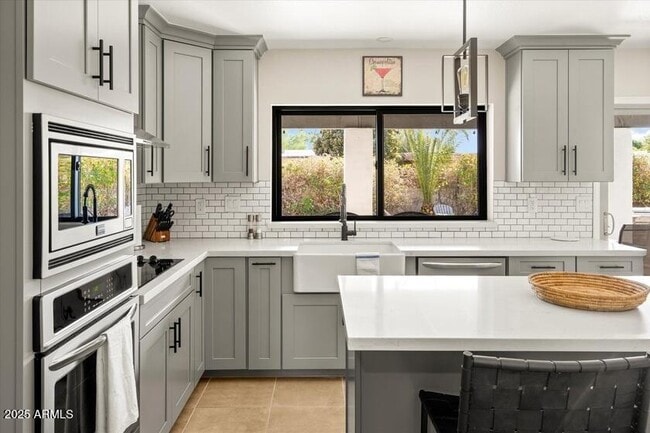 Building Photo - 6547 E Voltaire Ave