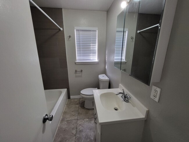 Building Photo - 2 bedroom 1 bathroom house with 1 car garage and central heat and air