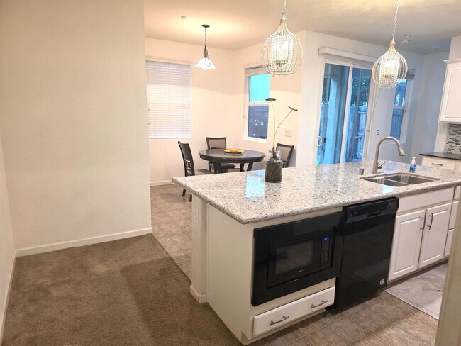 Building Photo - Spacious 5BR + Loft in Hamptons Village – Studio Suite, New HVAC, EV Charging