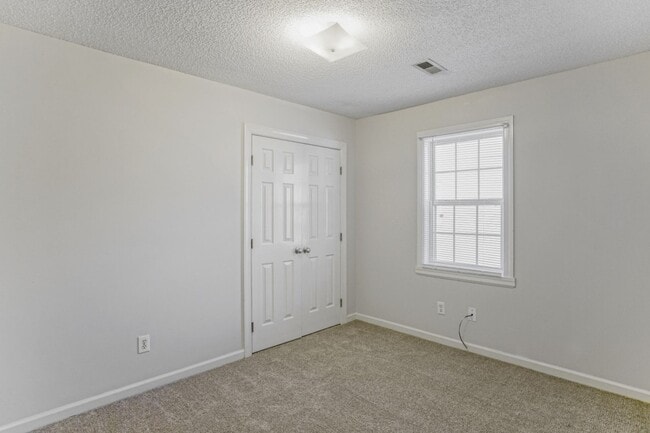 Building Photo - 3418 Pear Tree Court Unit B