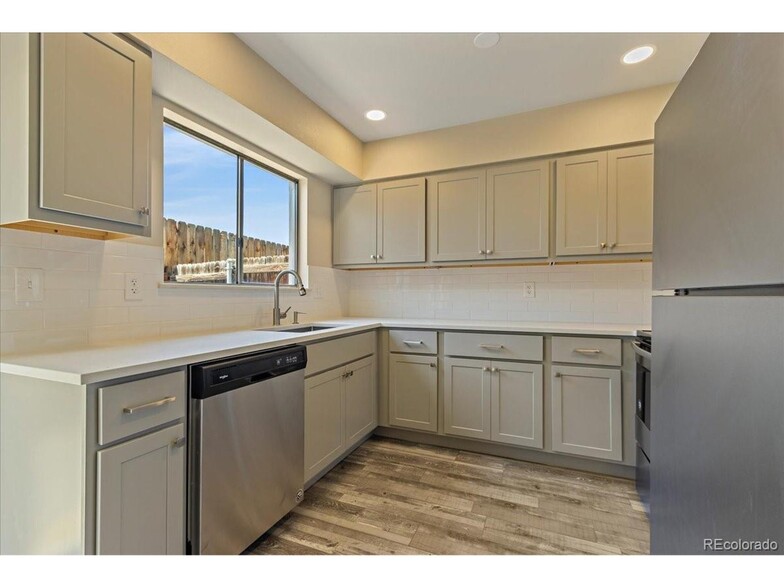 bright light in kitchen - 6495 E Happy Canyon Rd