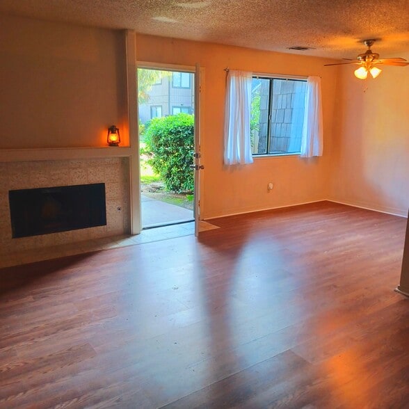 Living Room. Front Door opens to Greenbelt - 1190 S Winery Ave