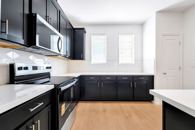 Building Photo - Modern Living in Cadence | Stylish Townhome with Open Concept & Community Amenities!