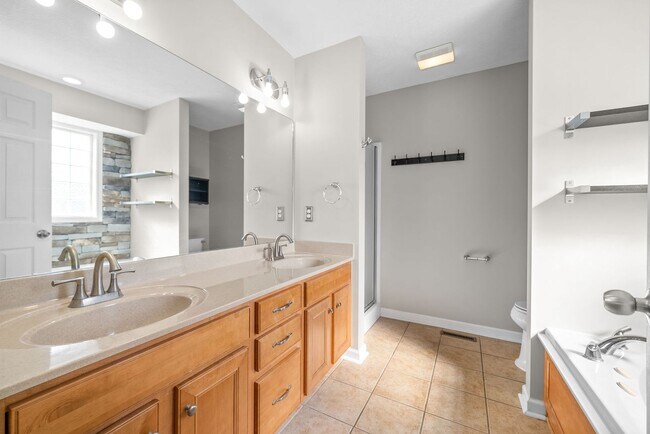 Building Photo - Pet Friendly Three Bedroom with Bonus!