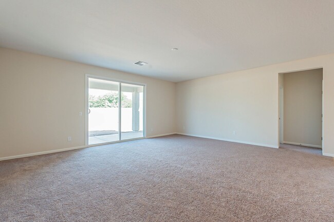 Building Photo - Beautiful New Spacious Home Includes 3 car...