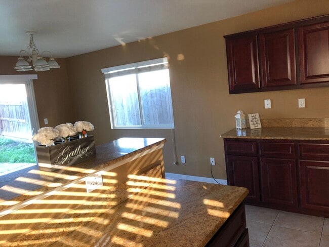 Building Photo - Three Bedroom Two Bathroom Two-Story Home for Rent