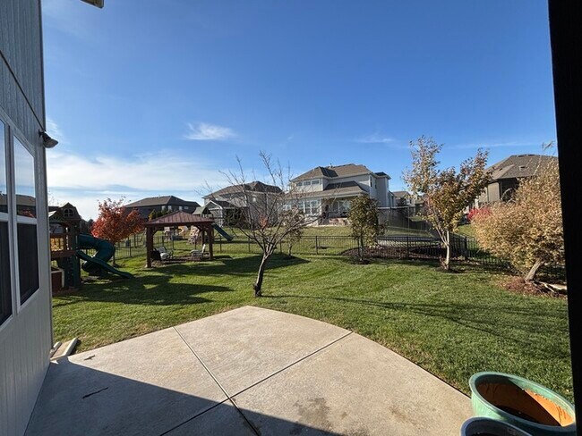Building Photo - Modern Olathe Beauty with Covered Lanai, Loft & Main-Level Primary Suite
