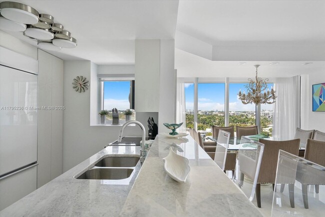 Building Photo - 10275 Collins Ave