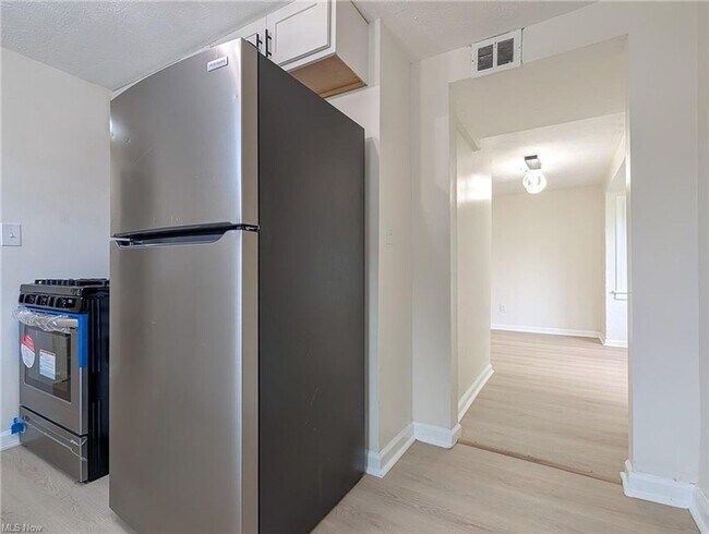 Building Photo - A Fresh Start on a Quiet Street – Everything new for you plus half off first months rent is waiting!