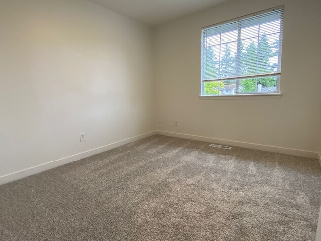 Building Photo - Stylishly Renovated Home with Private Back...