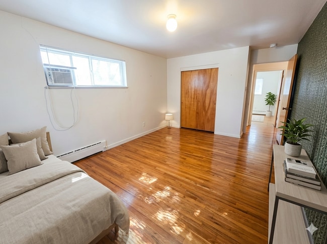 Building Photo - Spacious 2 Bedroom with Large Living Room and Separate Dining Area – Over 1,100 Sq Ft