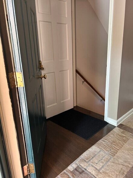 Photo from main entrance with basement entrance pictured. - 616 Windham Ln