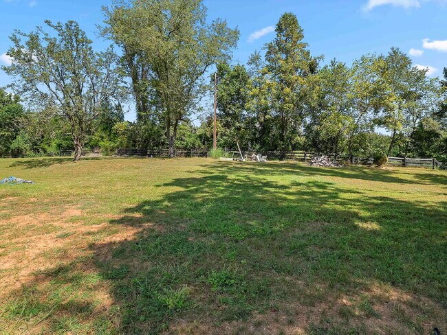 Building Photo - Stunning Oakton Retreat on a Sprawling 5-A...