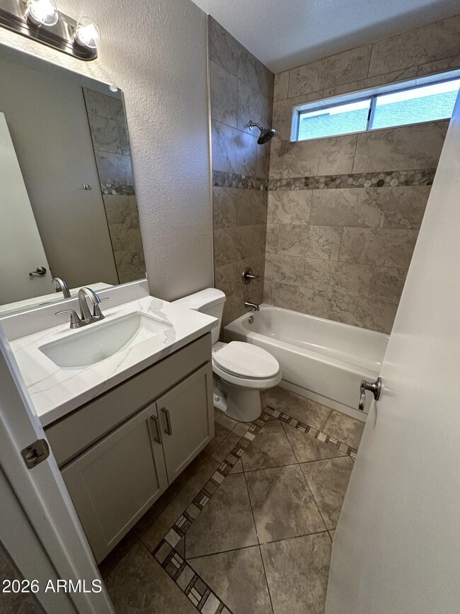 Building Photo - 8663 N 107th Dr