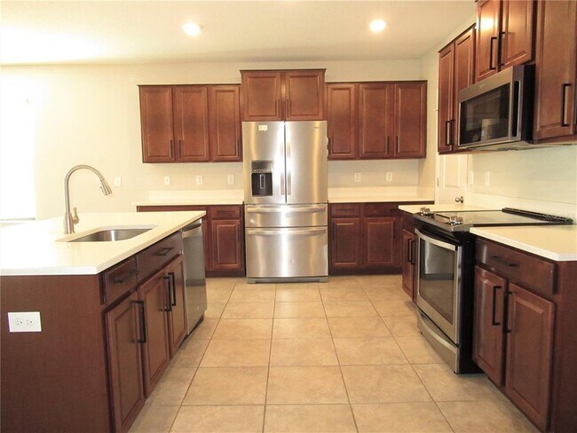Building Photo - 10120 Rose Petal Pl