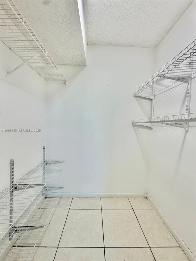 Building Photo - 8750 N Sherman Cir