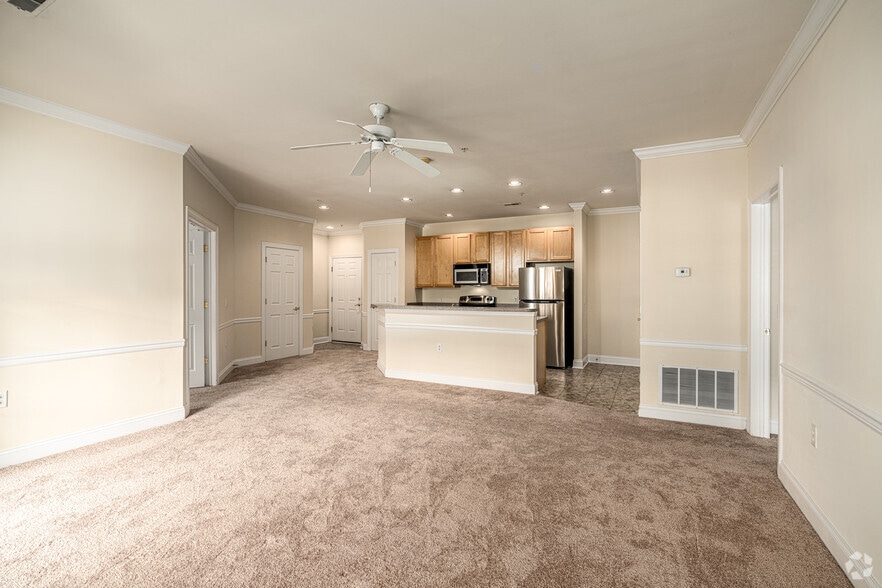 1BR, 1.5BA - 1056SF - Living Room - The Helm and Deemers Landing