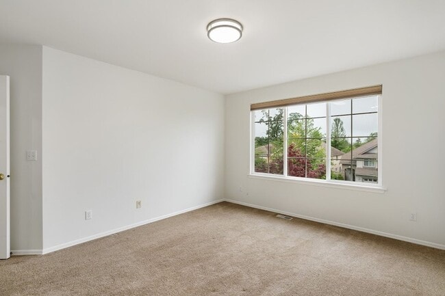 Building Photo - A Beautiful Picture Perfect Home with 4 Be...
