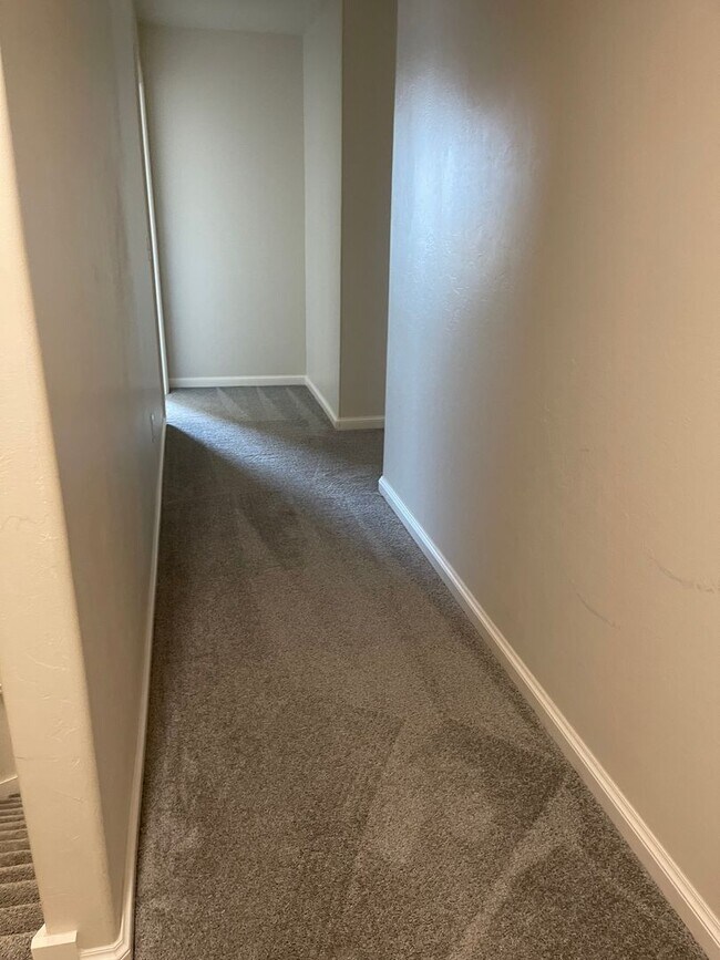 Building Photo - *Fully Furnished* 4 bedroom, 2.5 bathroom, 2 car garage Gated Neighborhood